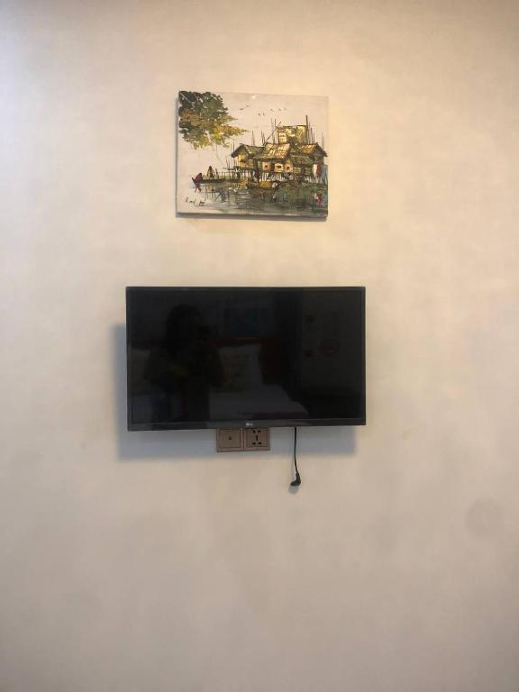 TV a/nebo společenská místnost v ubytování Seagull Guesthouse Kampot