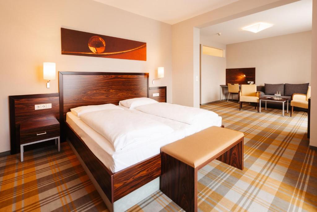 Postel nebo postele na pokoji v ubytování Hotel Liebmann