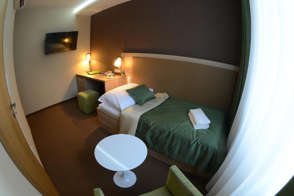 Posteľ alebo postele v izbe v ubytovaní Hotel Stardust