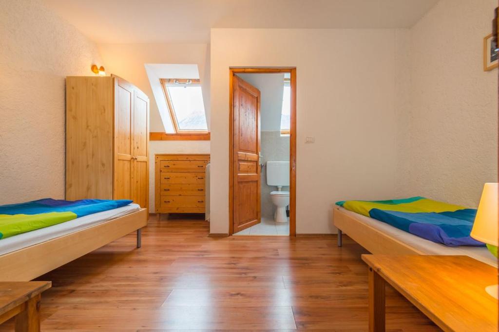Postel nebo postele na pokoji v ubytování Mala Vas Chalet