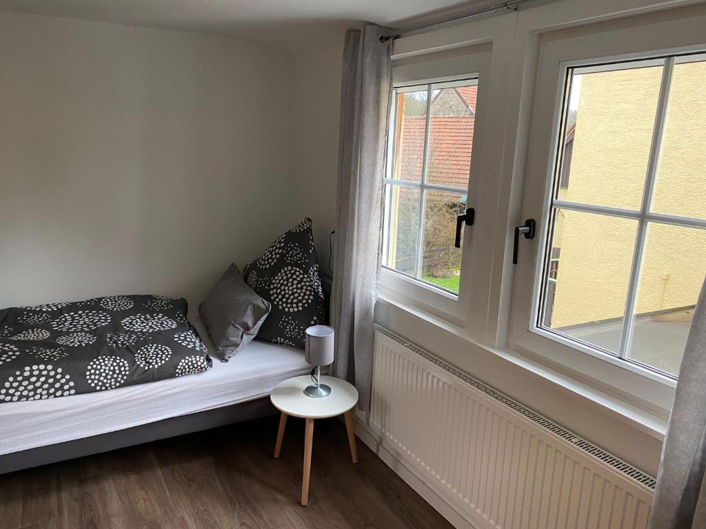 Postel nebo postele na pokoji v ubytování Ferienhaus Am Riedbach - Birstein