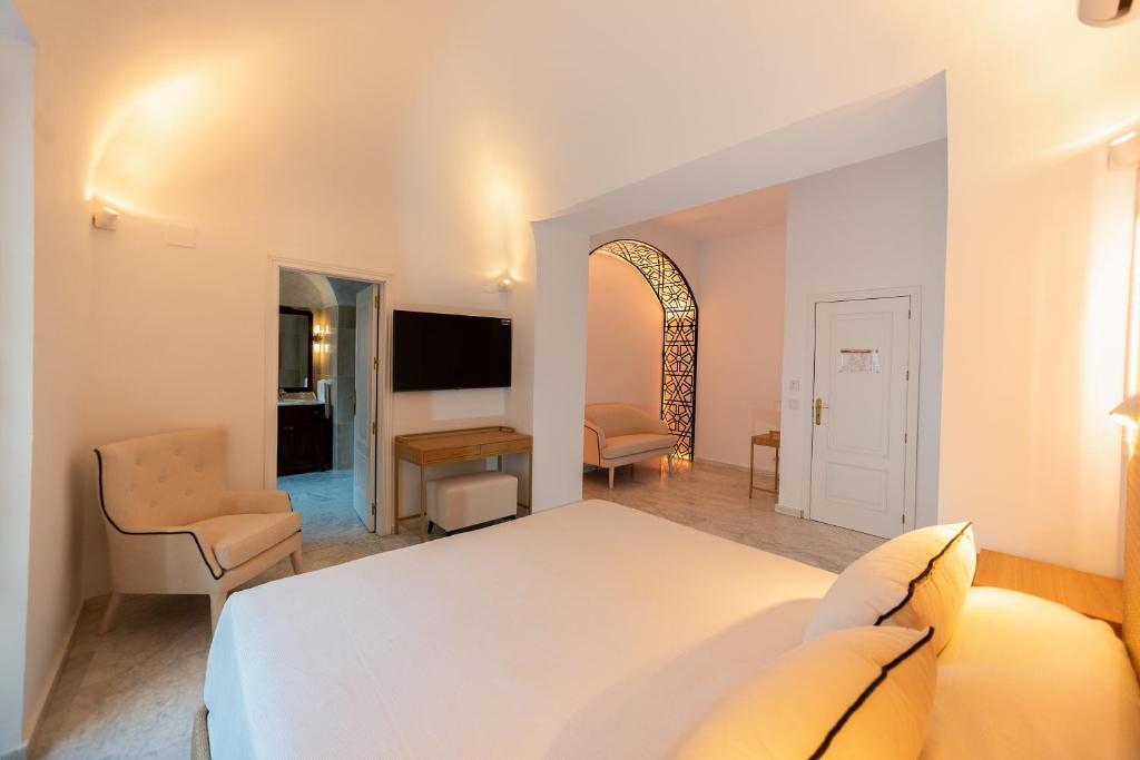 Posteľ alebo postele v izbe v ubytovaní Hotel Casa Palacio la Sal