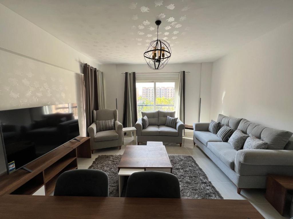 Ruang duduk di Luxury and Cheapest Apartment