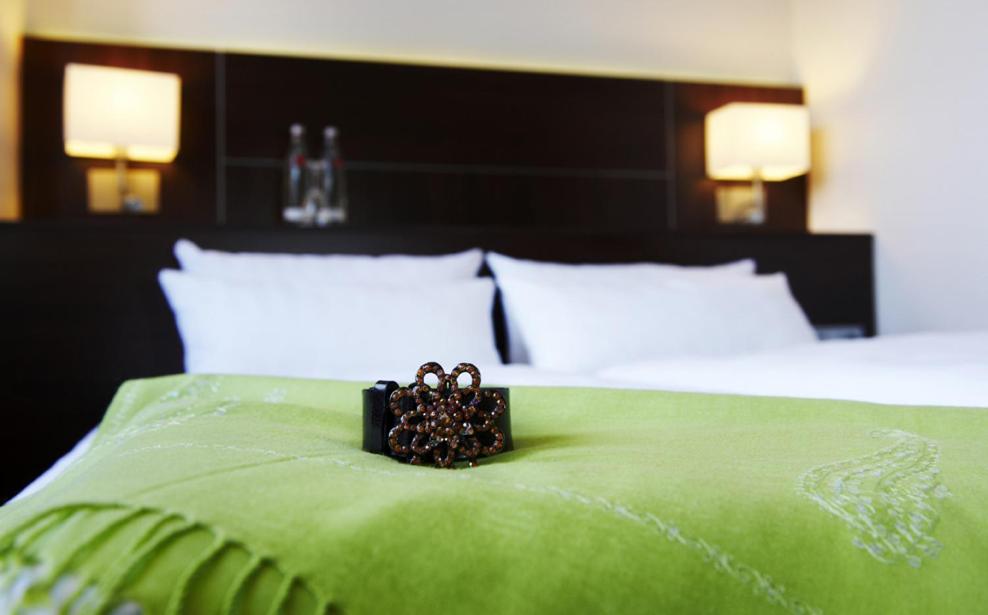 Postel nebo postele na pokoji v ubytování Stern Hotel Soller