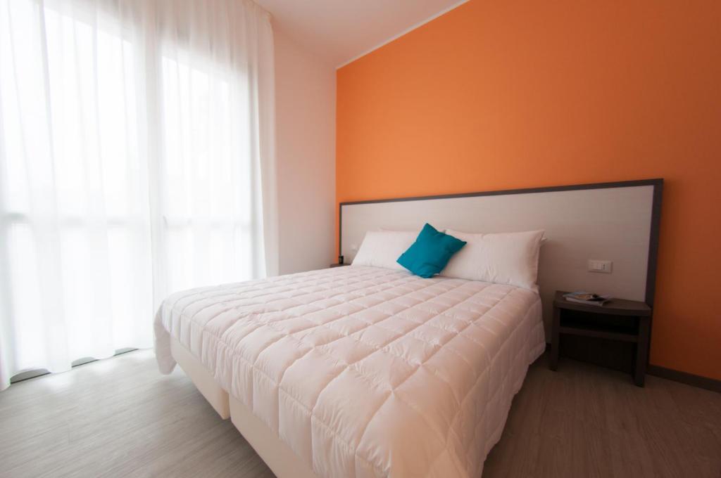 Łóżko lub łóżka w pokoju w obiekcie 29 Cav Apartments