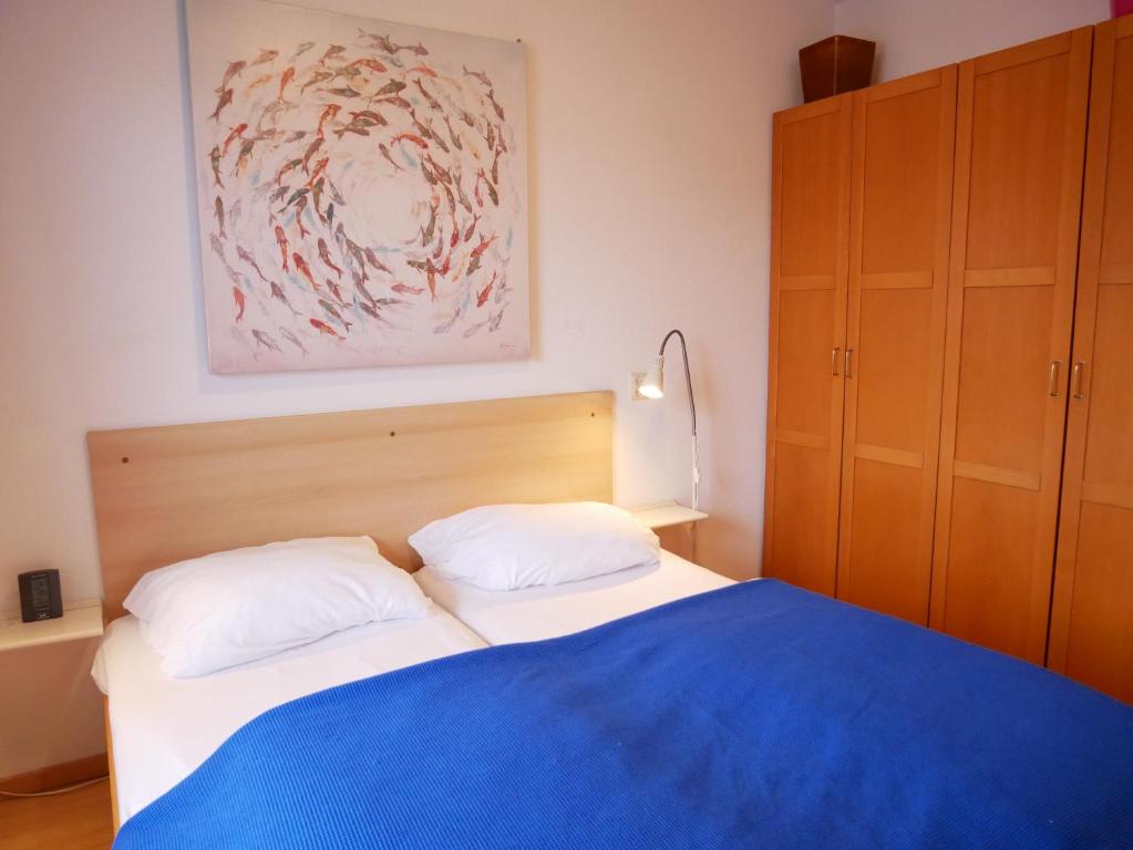 Postel nebo postele na pokoji v ubytování Badhotel Callantsoog