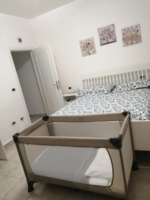 Postel nebo postele na pokoji v ubytování B&B COLLE TARIGNI