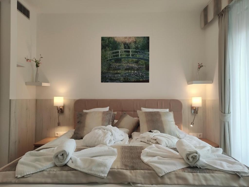 Łóżko lub łóżka w pokoju w obiekcie Spa Residence Carbona Iguacu Apartman