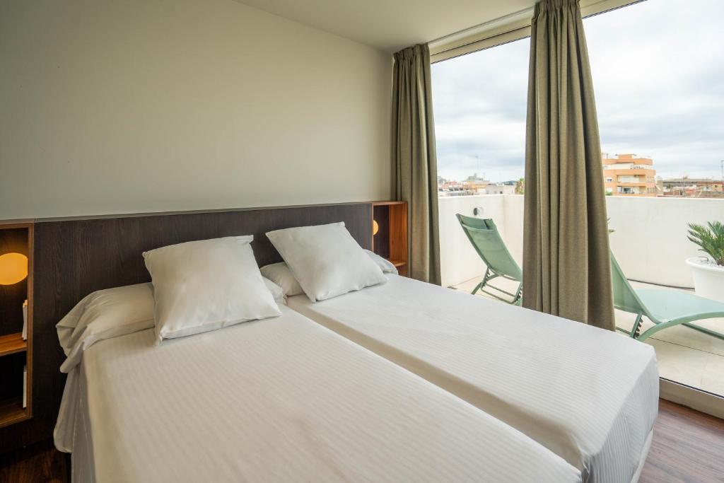 Postel nebo postele na pokoji v ubytování Teide Rooms