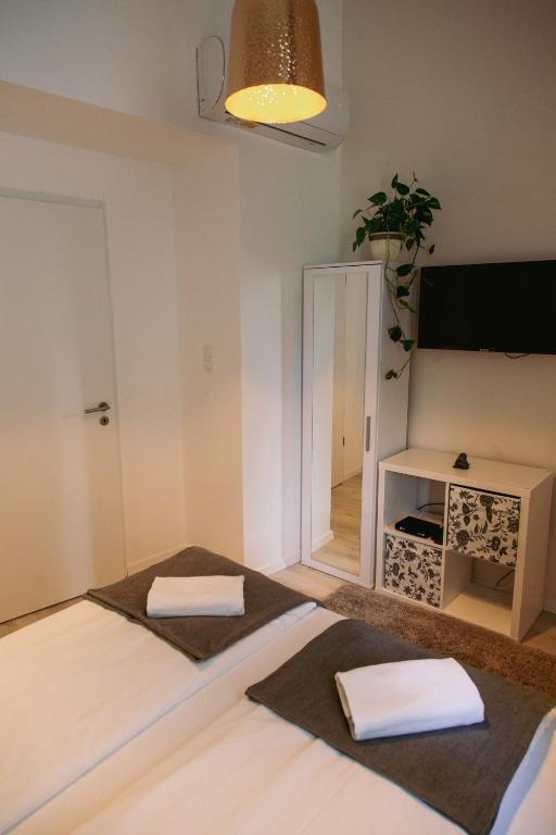 Posteľ alebo postele v izbe v ubytovaní Apartment Latte