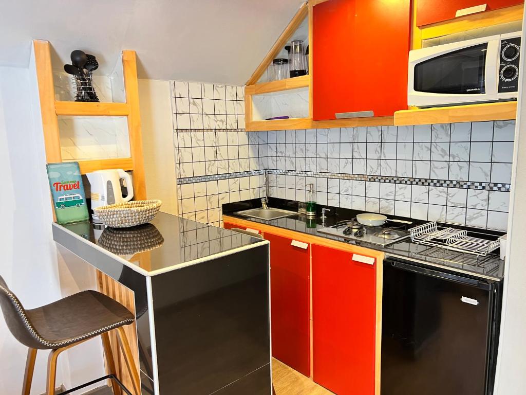 Kuchyň nebo kuchyňský kout v ubytování Spazios Apart Hotel Reñaca