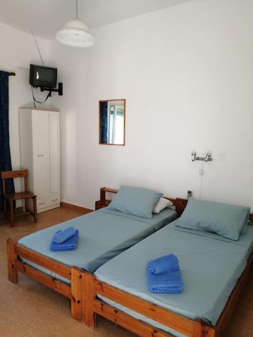 Postel nebo postele na pokoji v ubytování RODON PANDELI APARTMENT in Spilia Leros