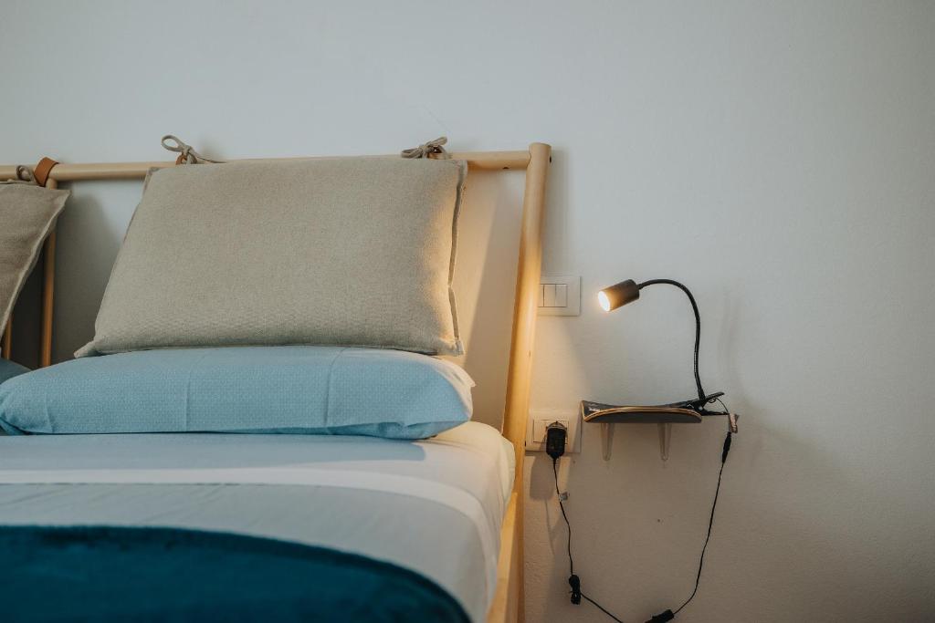 Postel nebo postele na pokoji v ubytování Casa Allegranza