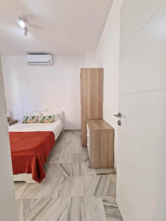 Posteľ alebo postele v izbe v ubytovaní Ático moderno con terraza privada en Málaga centro