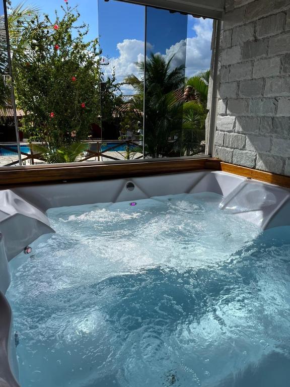 A piscina em ou perto de Pousada Encanto dos Anjos