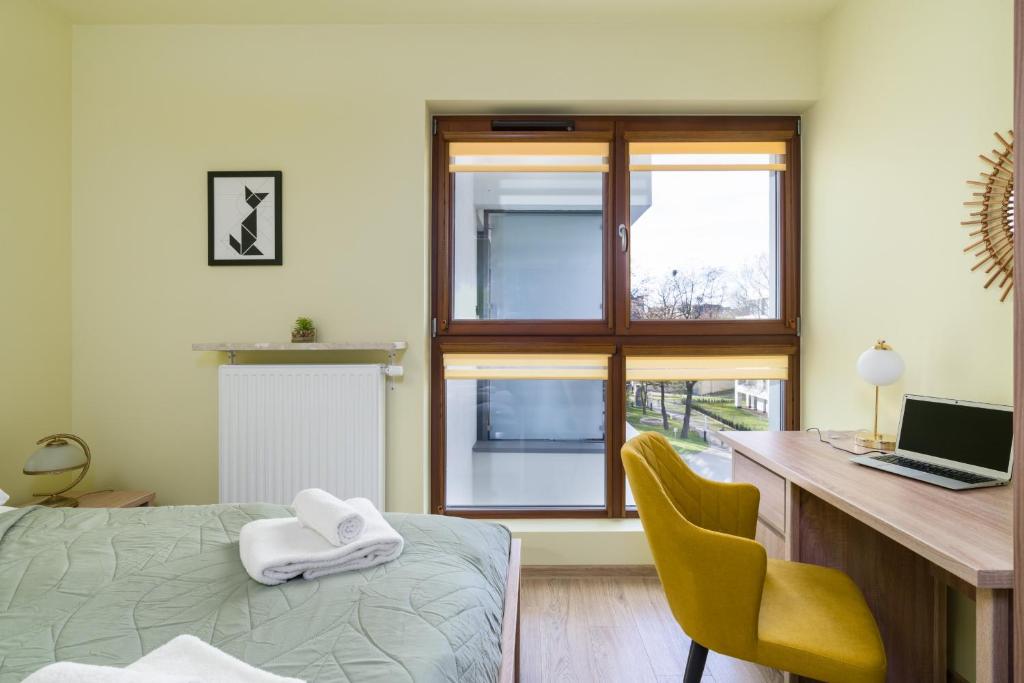 Posteľ alebo postele v izbe v ubytovaní Bukowska 18 Apartments MTP Poznań by Noclegi Renters