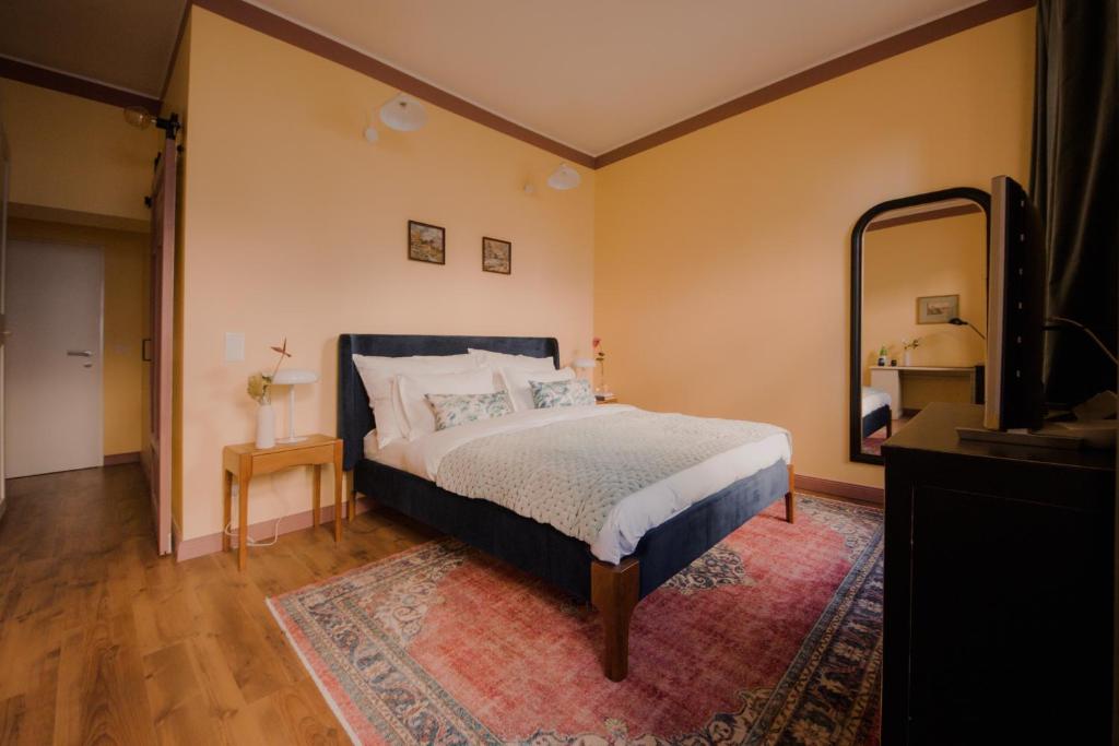 Postel nebo postele na pokoji v ubytování Oak House Vienna
