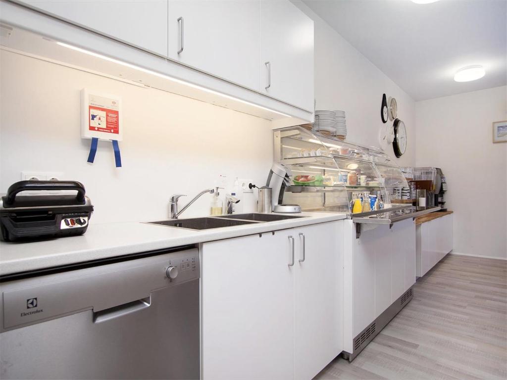 Kuchyň nebo kuchyňský kout v ubytování KEF Guesthouse by Keflavík airport