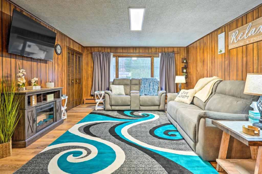 a living room with a couch and a carpet at Salamanca Home about 9 Mi to Holiday Valley Resort in Salamanca