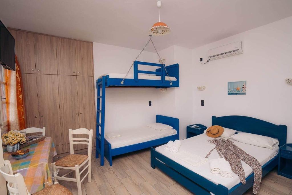 Postel nebo postele na pokoji v ubytování Oniropagida