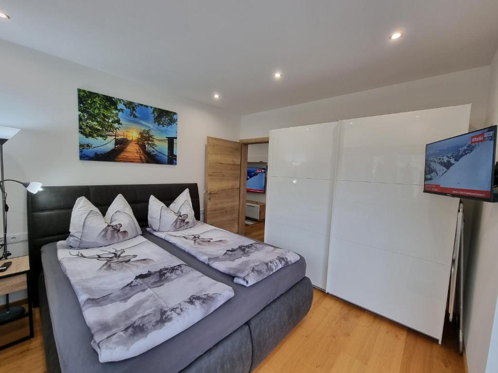 Posteľ alebo postele v izbe v ubytovaní Golf & Ski Appartements Mittersill Trausmuth Monika inkl Sommercard - Golfplatz 500 m entfernt, inkl Waschmaschine, Trockner