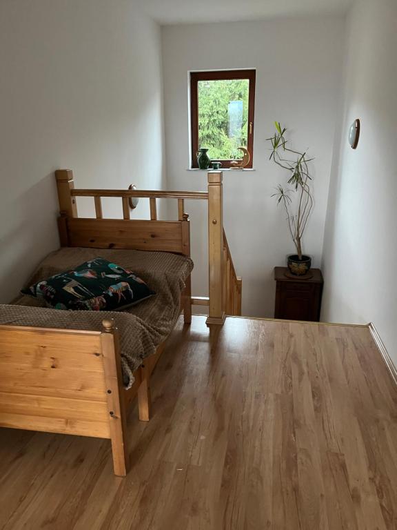 Postel nebo postele na pokoji v ubytování Leśny Zdrój
