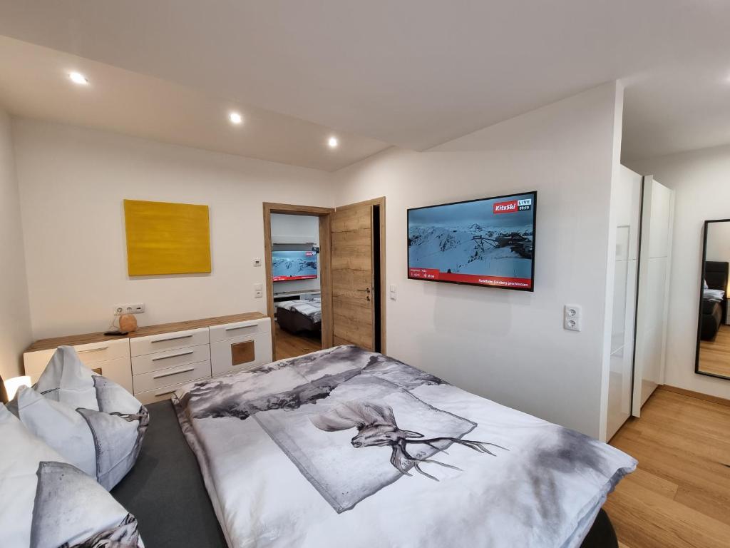 Posteľ alebo postele v izbe v ubytovaní Golf & Ski Appartements Mittersill Trausmuth Monika inkl Sommercard - Golfplatz 500 m entfernt, inkl Waschmaschine, Trockner