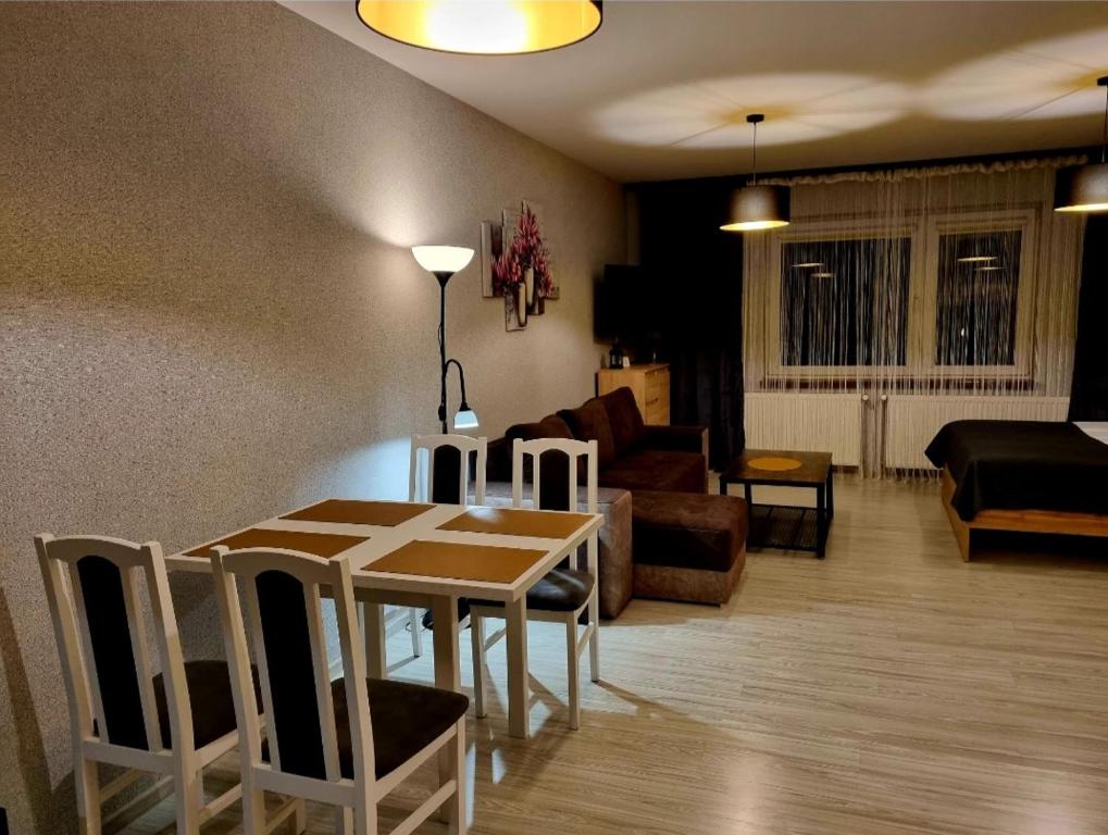 Posedenie v ubytovaní Willa "Aparthause" E-Apartamenty