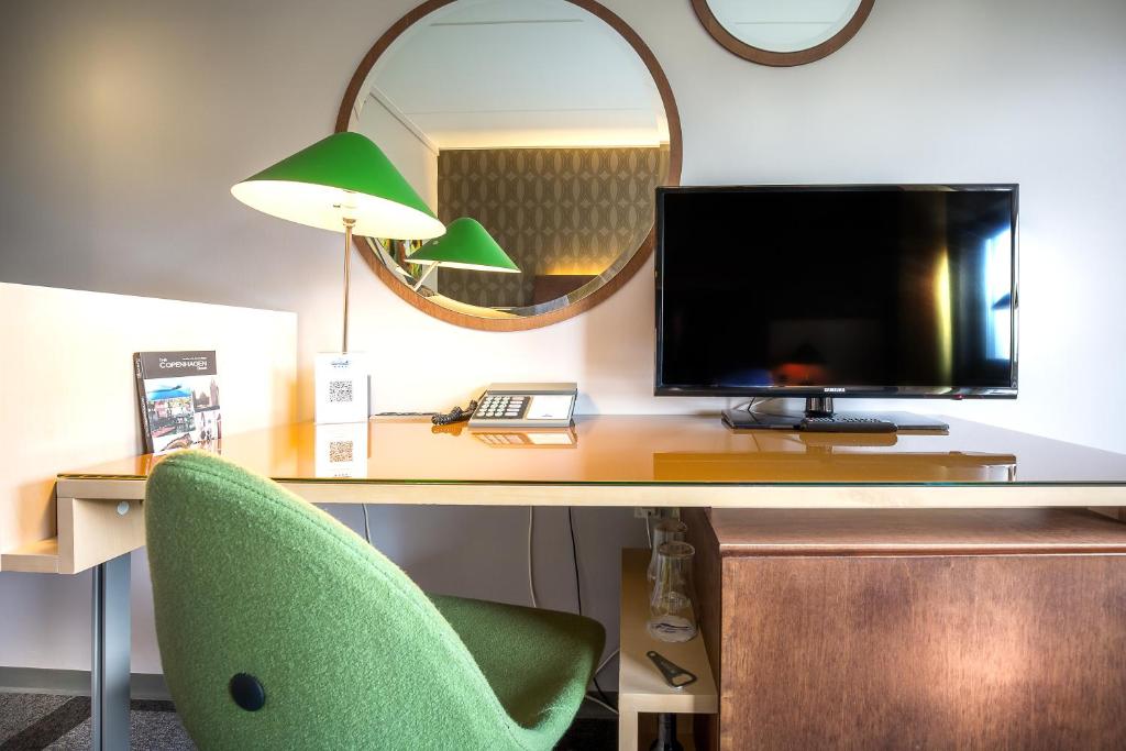 TV a/nebo společenská místnost v ubytování Hotel Lautrup Park