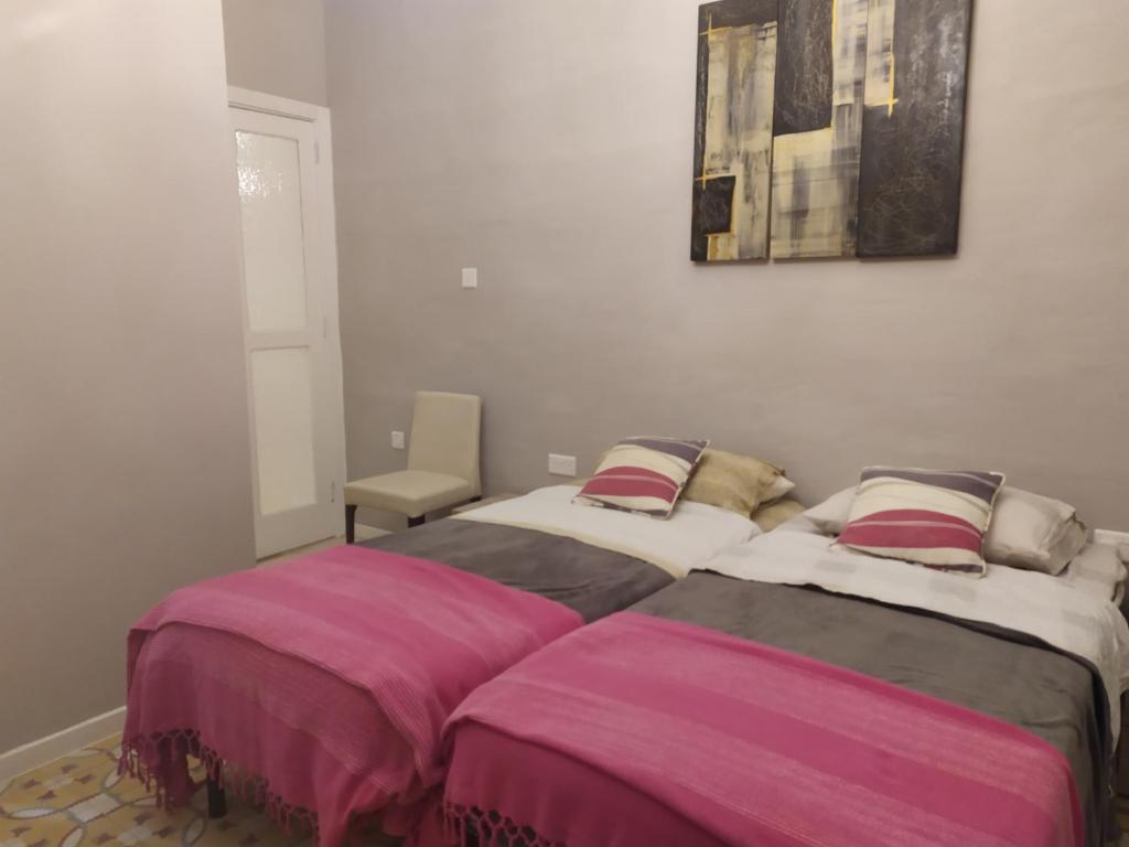 Postel nebo postele na pokoji v ubytování Casa Manduca Delicata