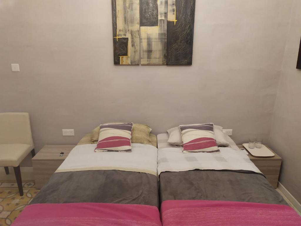 Postel nebo postele na pokoji v ubytování Casa Manduca Delicata