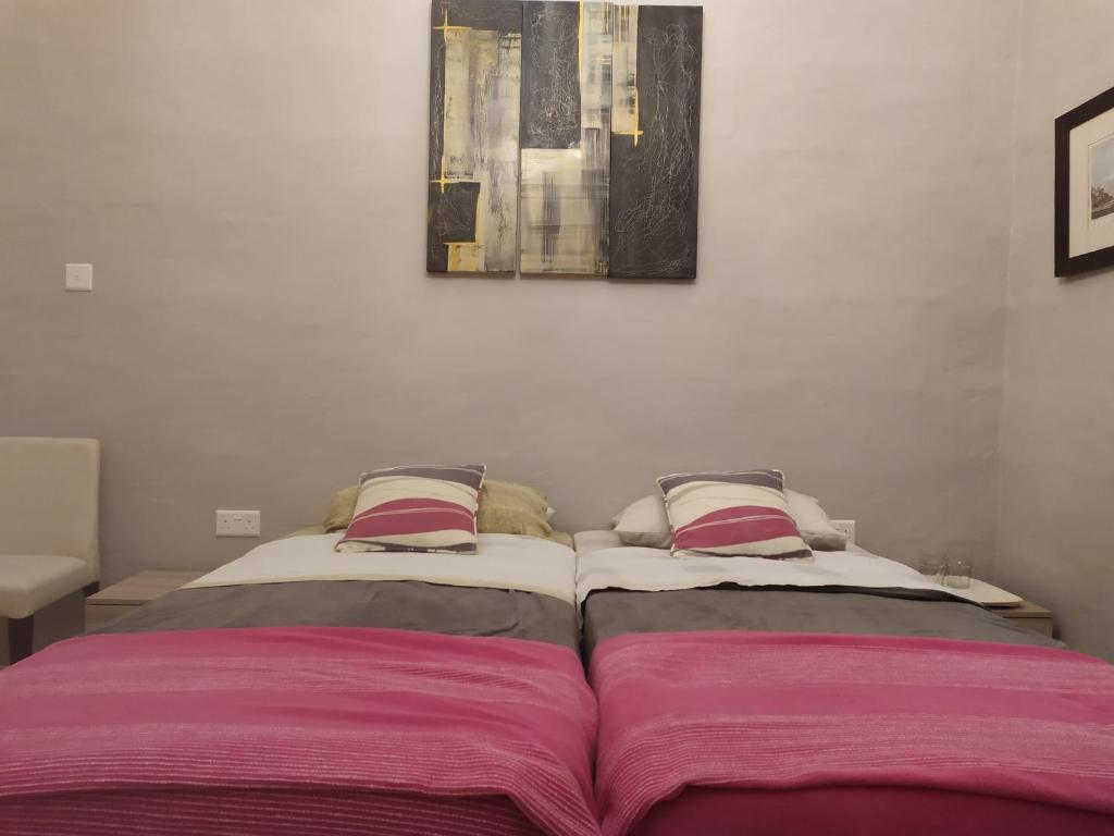 Postel nebo postele na pokoji v ubytování Casa Manduca Delicata