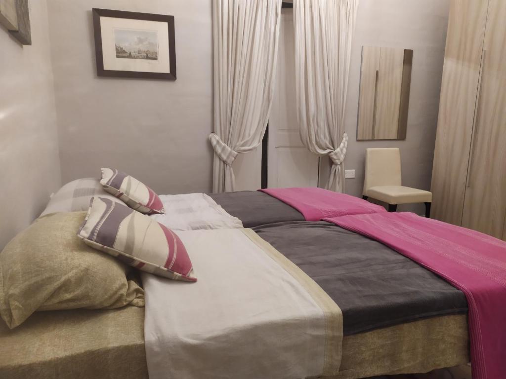 Postel nebo postele na pokoji v ubytování Casa Manduca Delicata