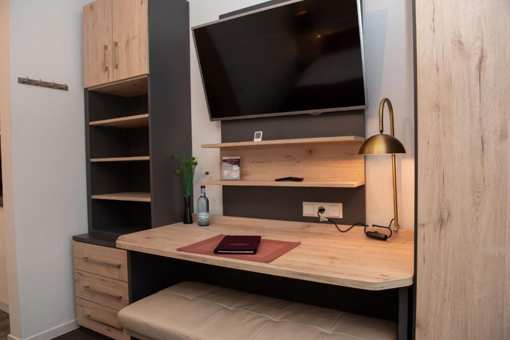 TV a/nebo společenská místnost v ubytování Apartments Amtzell, Selbst-Check-in