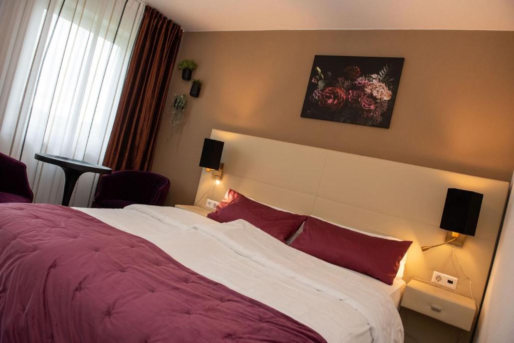 Postel nebo postele na pokoji v ubytování Apartments Amtzell, Selbst-Check-in