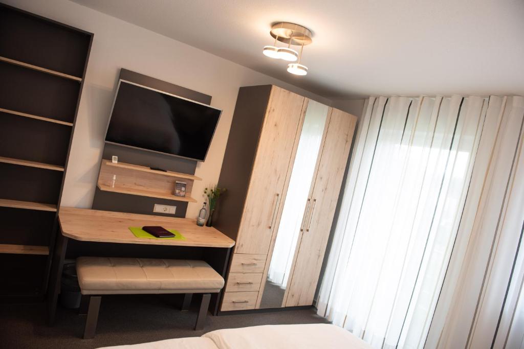 TV a/nebo společenská místnost v ubytování Apartments Amtzell, Selbst-Check-in