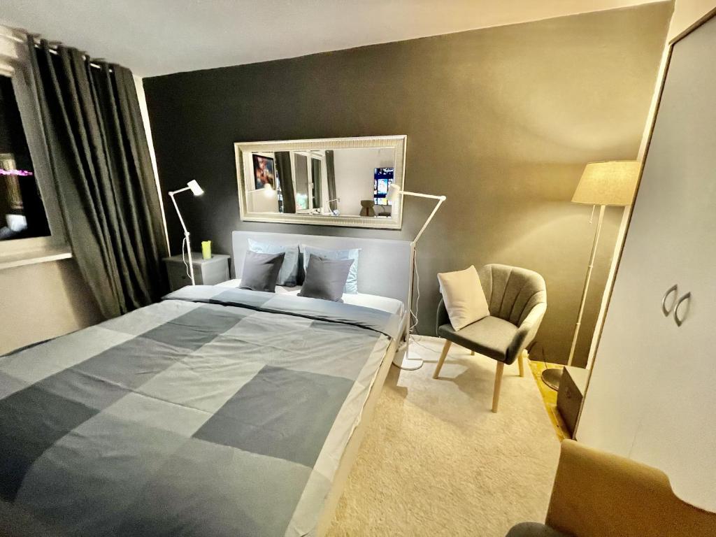 Posteľ alebo postele v izbe v ubytovaní HOLIDAY 4 metro WiFi 70'TV Netflix Disney AppleTV