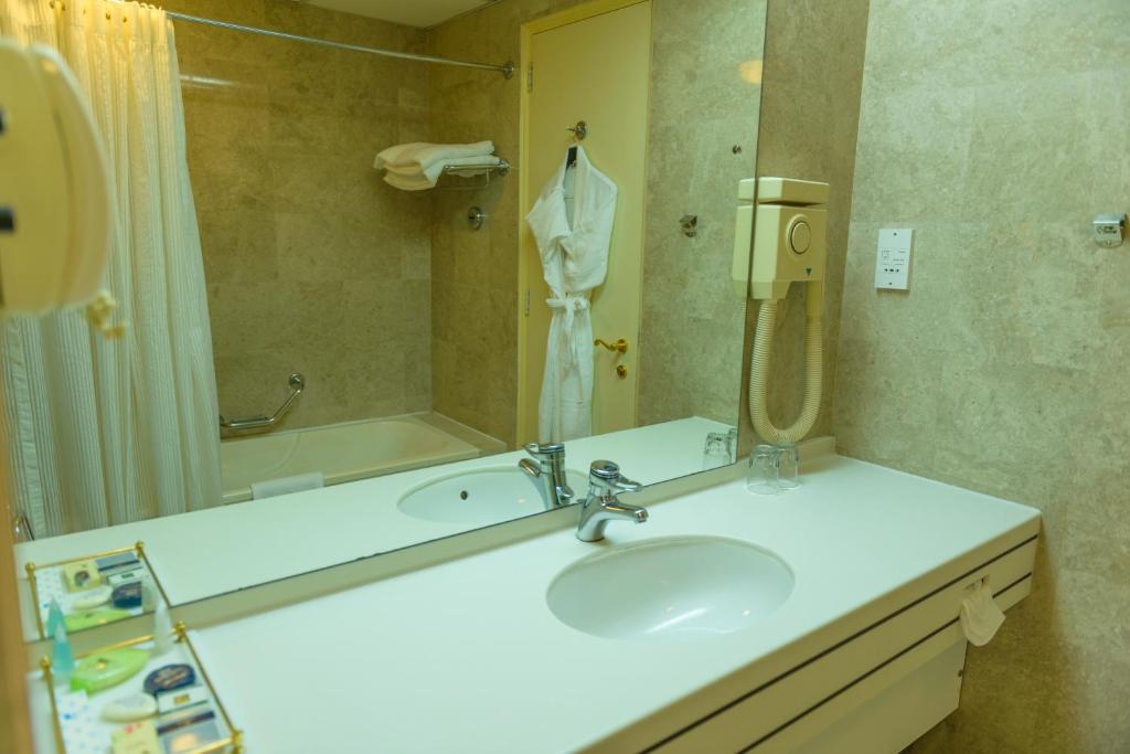 Koupelna v ubytování Al Qurum Resort