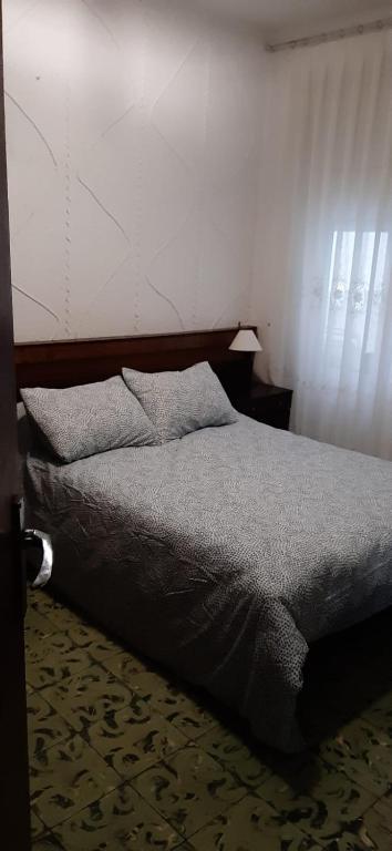 Posteľ alebo postele v izbe v ubytovaní Casa en Puerto de Sagunto. Playa