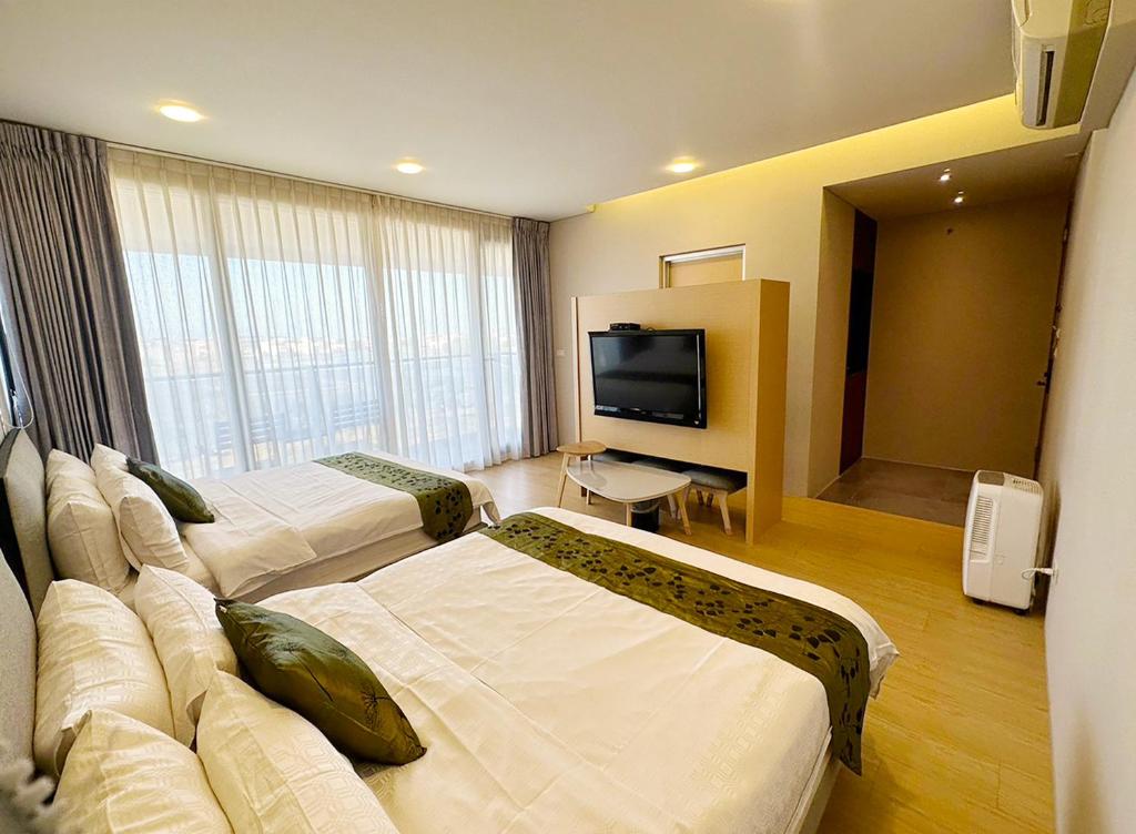 TV a/nebo společenská místnost v ubytování Master Homestay