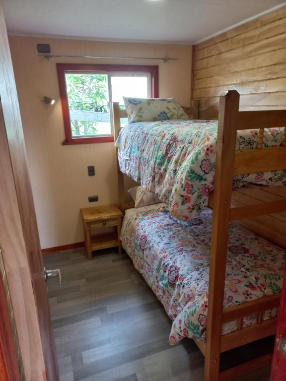 Postel nebo postele na pokoji v ubytování Agroturismo Coñico