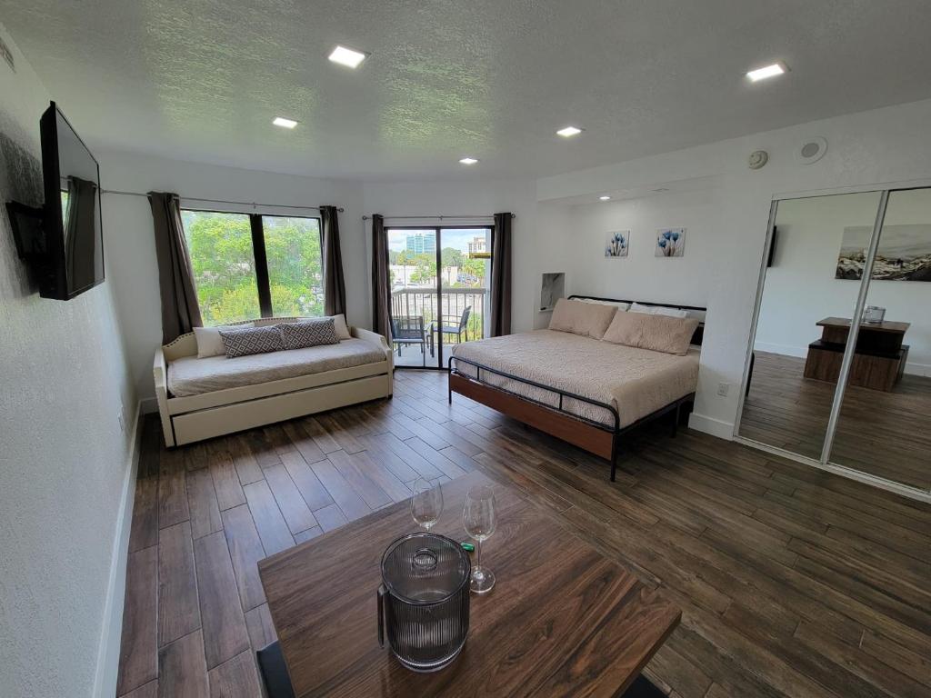 a living room with a bed and a couch at 3407 Luxury option for your visit in Orlando