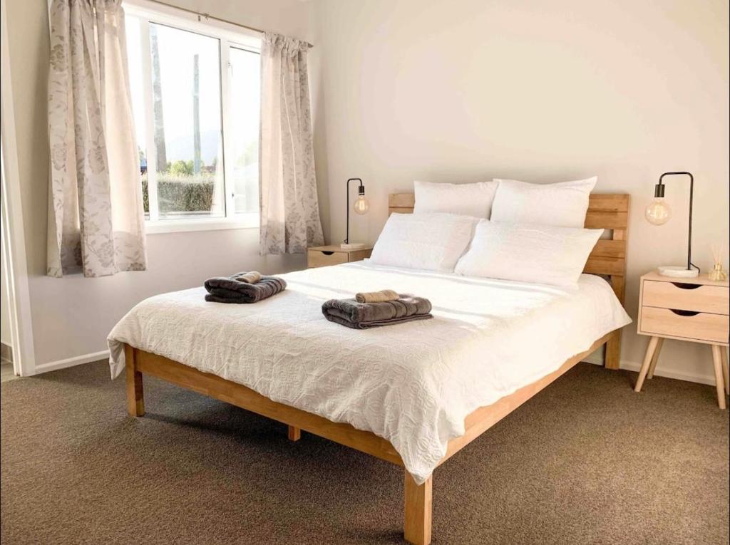 Postel nebo postele na pokoji v ubytování Large Bright Guest House