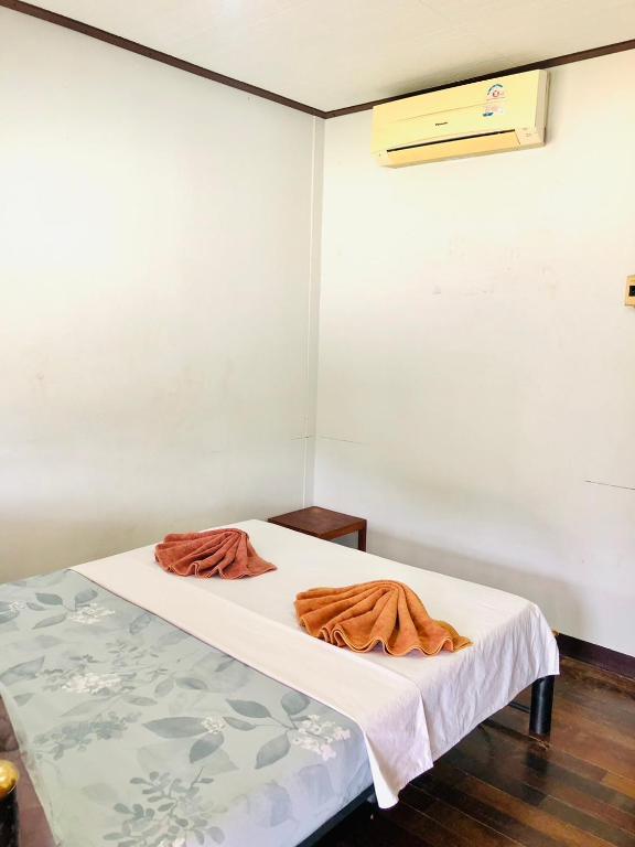 Postel nebo postele na pokoji v ubytování JR GYM & Resort