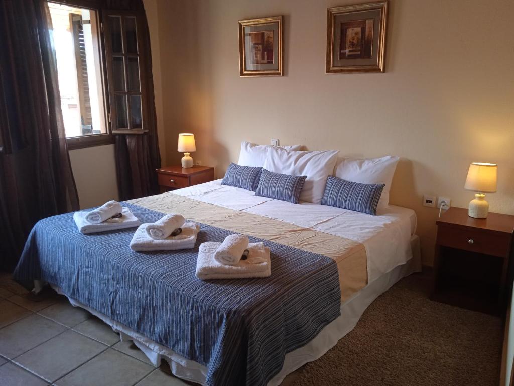 Postel nebo postele na pokoji v ubytování Thiamis Guesthouse