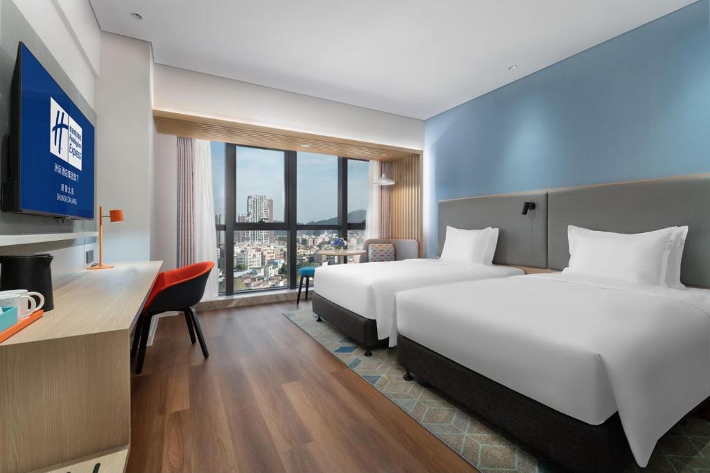 Postel nebo postele na pokoji v ubytování Holiday Inn Express Shunde Daliang by IHG