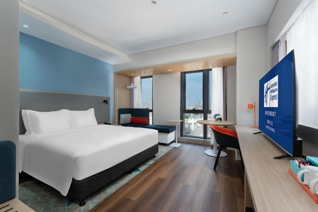 Postel nebo postele na pokoji v ubytování Holiday Inn Express Shunde Daliang by IHG