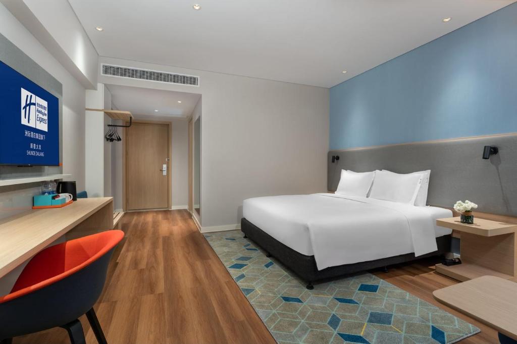 Postel nebo postele na pokoji v ubytování Holiday Inn Express Shunde Daliang by IHG