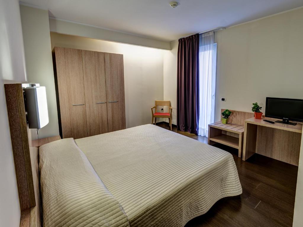 TV a/nebo společenská místnost v ubytování Hotel Capital