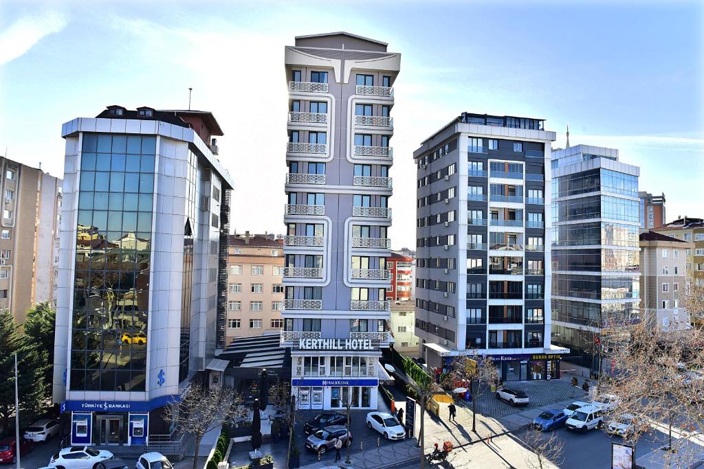 a view of two tall buildings in a city at Kerthill Hotel in Istanbul